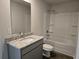 Full bathroom with granite countertop, vanity, and shower/tub combo at 1594 Sungrown Way, Mcdonough, GA 30253
