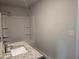 Modern bathroom featuring a granite vanity and shower with tub at 1594 Sungrown Way, Mcdonough, GA 30253