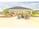 Inviting outdoor seating area with a fire pit and comfortable chairs for community gatherings at 1594 Sungrown Way, Mcdonough, GA 30253