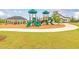 Community playground featuring slides and climbing structures for outdoor fun and recreation at 1594 Sungrown Way, Mcdonough, GA 30253