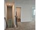 Carpeted staircase leading to the second floor at 1594 Sungrown Way, Mcdonough, GA 30253