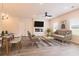 Bright living and dining room with contemporary furnishings and stylish decor at 1595 Sungrown Way, Mcdonough, GA 30253