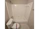 Clean bathroom featuring a tiled shower-tub combo, neutral walls, and modern fixtures for everyday comfort at 200 Williamsburg Way, Fayetteville, GA 30214