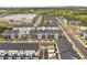 This aerial view showcases the desirable location of the townhomes near retail shopping areas at 823 Mackay Crk, Woodstock, GA 30188