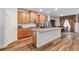 Spacious kitchen with granite countertops, stainless steel appliances, and wood cabinets at 823 Mackay Crk, Woodstock, GA 30188