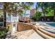 Backyard features include an in-ground pool, stone retaining wall, and a deck perfect for entertaining at 1159 Thornwell Ne Dr, Brookhaven, GA 30319