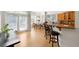 Open-concept kitchen and dining area with granite counters, stainless appliances, and plenty of natural light at 1159 Thornwell Ne Dr, Brookhaven, GA 30319