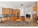 Gourmet kitchen featuring granite countertops, stainless appliances, and a kitchen island with a gas cooktop at 1159 Thornwell Ne Dr, Brookhaven, GA 30319