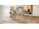 Kitchen with breakfast bar and stainless steel appliances at 1159 Thornwell Ne Dr, Brookhaven, GA 30319