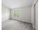Bedroom featuring plush carpet, natural light, and a closet at 2965 Carrie Farm Nw Rd, Kennesaw, GA 30144