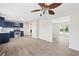 Bright kitchen features stainless steel appliances, blue cabinets, and an open layout at 2965 Carrie Farm Nw Rd, Kennesaw, GA 30144