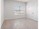 Bright bedroom with a large window and closet at 625 Skytop Dr, Cumming, GA 30040