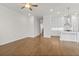 Open concept: Living room and modern kitchen with sleek countertops and stainless steel appliances at 625 Skytop Dr, Cumming, GA 30040