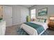 This bright bedroom has an area rug, carpet, and a large window view at 108 Wheelers Dr, Dallas, GA 30157