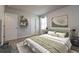 This bright bedroom is carpeted with light-colored walls and features floating shelves and a window view at 108 Wheelers Dr, Dallas, GA 30157