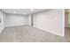 Spacious finished basement with recessed lighting and neutral carpeting at 144 Grayland Hills Ct, Lawrenceville, GA 30046