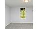 Bedroom with neutral carpet, a window, and fresh paint at 144 Grayland Hills Ct, Lawrenceville, GA 30046