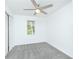 Cozy bedroom with neutral carpet, ceiling fan, and a window at 144 Grayland Hills Ct, Lawrenceville, GA 30046