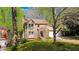 Inviting front exterior of a two-story home with a well-maintained lawn and driveway at 144 Grayland Hills Ct, Lawrenceville, GA 30046