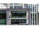 Multi-level balconies with city views, outdoor seating, and barbecue grills for entertaining at 2425 Peachtree Ne Rd # 1409, Atlanta, GA 30305