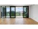 Balcony view featuring the city skyline, green treetops, and a built in gas grill at 2425 Peachtree Ne Rd # 1409, Atlanta, GA 30305