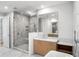 Well-lit bathroom boasts a glass-enclosed shower and modern vanity with marble accents at 2425 Peachtree Ne Rd # 1409, Atlanta, GA 30305