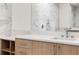 Bright bathroom featuring marble tiling, a modern vanity, and a sleek countertop at 2425 Peachtree Ne Rd # 1409, Atlanta, GA 30305