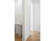 Bright bathroom with a pedestal sink, hardwood floors, and white trim at 2425 Peachtree Ne Rd # 1409, Atlanta, GA 30305