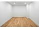 This spacious bedroom has hardwood floors, recessed lighting, and ample natural light at 2425 Peachtree Ne Rd # 1409, Atlanta, GA 30305