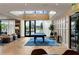Spacious billiard room featuring a skylight, herringbone floors, and a sophisticated seating area at 2425 Peachtree Ne Rd # 1409, Atlanta, GA 30305