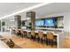 Modern common room featuring large-screen TVs, community seating, and contemporary design elements at 2425 Peachtree Ne Rd # 1409, Atlanta, GA 30305
