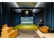 Indoor golf simulator room with comfortable seating and a high-tech gaming experience at 2425 Peachtree Ne Rd # 1409, Atlanta, GA 30305