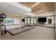 Bright gym space with mirrors and workout equipment for a great fitness experience at 2425 Peachtree Ne Rd # 1409, Atlanta, GA 30305