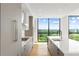 Modern kitchen featuring stainless appliances, an island, and a scenic outdoor view at 2425 Peachtree Ne Rd # 1409, Atlanta, GA 30305
