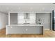 Modern kitchen with an island, stainless steel appliances, and lots of cabinet space at 2425 Peachtree Ne Rd # 1409, Atlanta, GA 30305