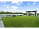 Rooftop lawn with ping pong table, lounge seating, and manicured landscaping perfect for social gatherings at 2425 Peachtree Ne Rd # 1409, Atlanta, GA 30305