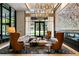 Elegant lobby featuring a modern fireplace, designer lighting, comfortable seating, and an inviting atmosphere at 2425 Peachtree Ne Rd # 1409, Atlanta, GA 30305