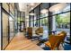 Stylish lounge featuring modern seating, tall windows, and a welcoming atmosphere at 2425 Peachtree Ne Rd # 1409, Atlanta, GA 30305