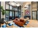 Elegant lounge with designer seating, large windows, and artistic decor at 2425 Peachtree Ne Rd # 1409, Atlanta, GA 30305