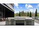 Rooftop outdoor kitchen featuring stainless steel grills, countertop space, and garden area, perfect for entertaining at 2425 Peachtree Ne Rd # 1409, Atlanta, GA 30305