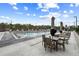 Rooftop pool with tables and chairs, lounge chairs, and shaded cabanas for elegant relaxation and entertainment at 2425 Peachtree Ne Rd # 1409, Atlanta, GA 30305