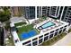 Rooftop amenities include a pool, pickleball court, and lounge areas, providing the ultimate urban retreat at 2425 Peachtree Ne Rd # 1409, Atlanta, GA 30305