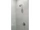 Close-up of a modern shower with gray tiling and sleek fixtures at 2425 Peachtree Ne Rd # 1409, Atlanta, GA 30305
