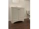 Bathroom featuring a white vanity cabinet, dark wood flooring, and a toilet at 2704 Cumberland Se Ct # 27, Smyrna, GA 30080
