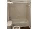 Bathroom featuring a shower-tub combo and a toilet at 2704 Cumberland Se Ct # 27, Smyrna, GA 30080