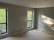 Bright bedroom with natural light, neutral carpet, and updated windows at 2704 Cumberland Se Ct # 27, Smyrna, GA 30080