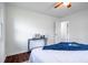 Bedroom with hardwood floors, white walls and a table at 80 E Howard St, Kingston, GA 30145