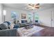 Bright living room showcasing hardwood floors, modern decor, and an inviting atmosphere, perfect for relaxation and entertainment at 80 E Howard St, Kingston, GA 30145
