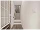 Bright entryway features wood-look flooring and a stairway to the upper level at 1297 Ascot Ter, Atlanta, GA 30329