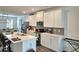 Eat-in kitchen features quartz countertops and stainless steel appliances at 1297 Ascot Ter, Atlanta, GA 30329